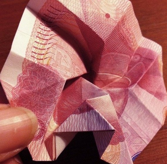 怎么用100元折玫瑰花图片大全
