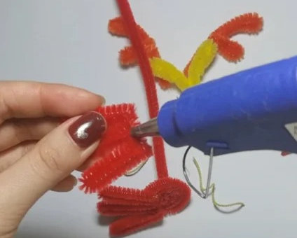 用扭扭棒编一只小龙崽子教程图解-图片2